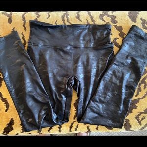 Shine star black on black camo print leggings.